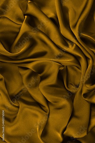 Smooth elegant silk or satin luxury cloth texture can use as wedding background. Luxurious background design.