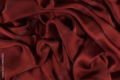 Smooth elegant silk or satin texture can use as abstract background. Luxurious background design