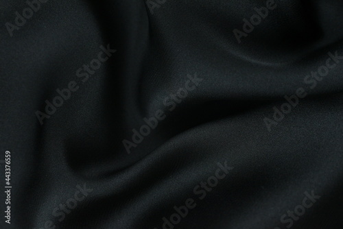 Background fabric. Dark textile fabric with texture and pattern drapery background