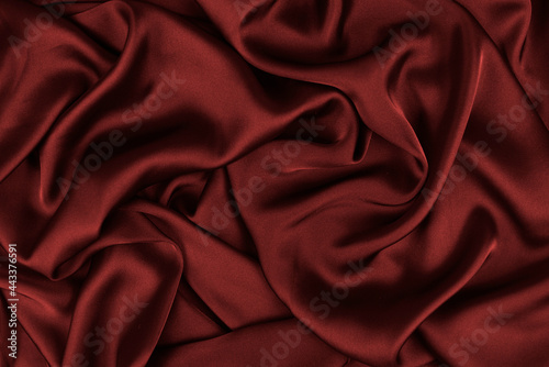 Smooth elegant silk or satin texture can use as abstract background. Luxurious background design