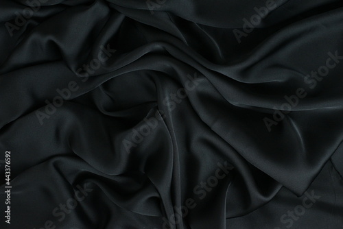Background fabric. Dark textile fabric with texture and pattern drapery background