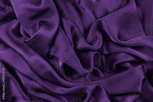 silk or satin luxury fabric texture can use as abstract background. Top view.