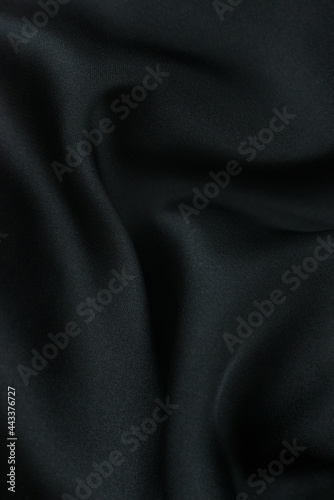 silk or satin luxury fabric texture can use as abstract background. Top view.