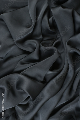 Abstract Satin Silky Cloth,Fabric Textile Drape with Crease Wavy Folds.with soft waves,waving in the wind.Texture of crumpled paper