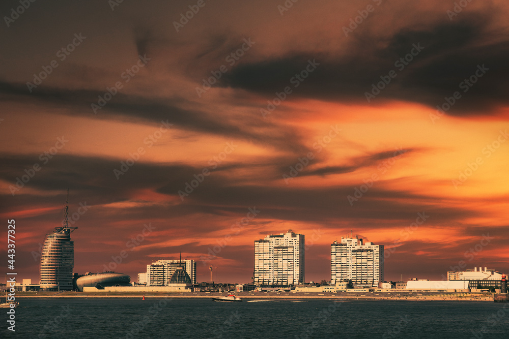 View of the skyline of Bremerhaven / Germany with a red sky in the evening 