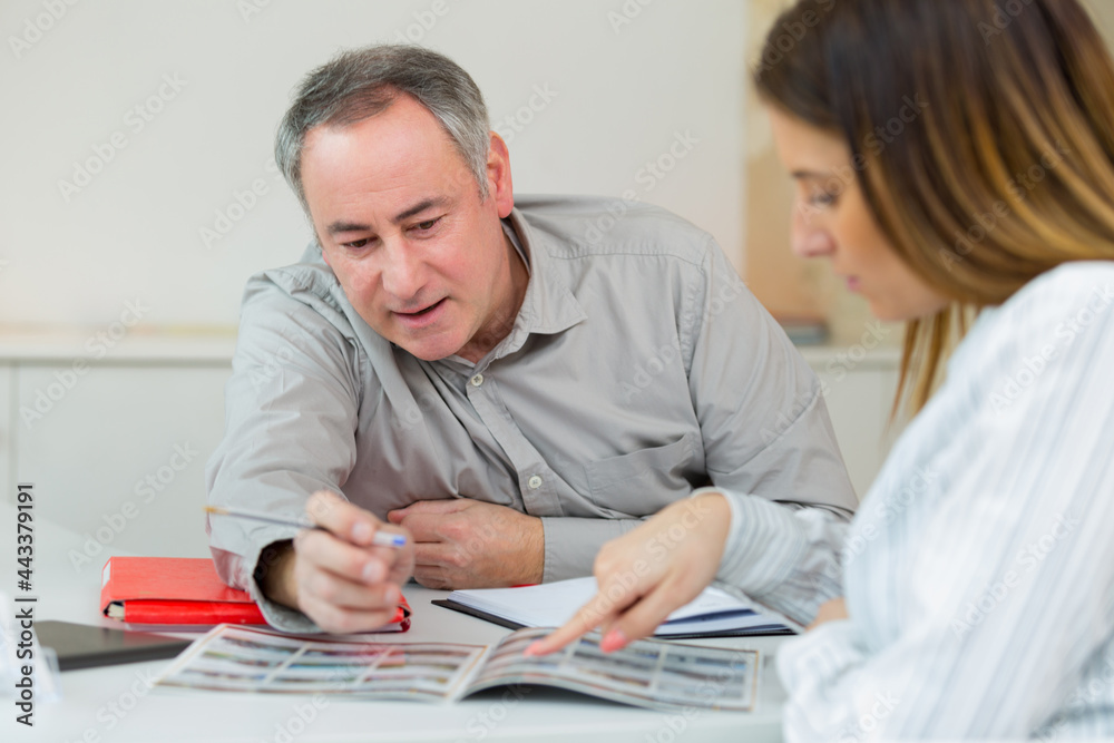 Obraz premium young man and woman tour agency concept