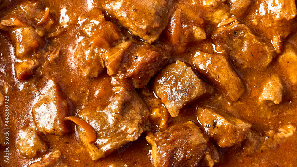 Traditional goulash meat food background. Macro, selective focus