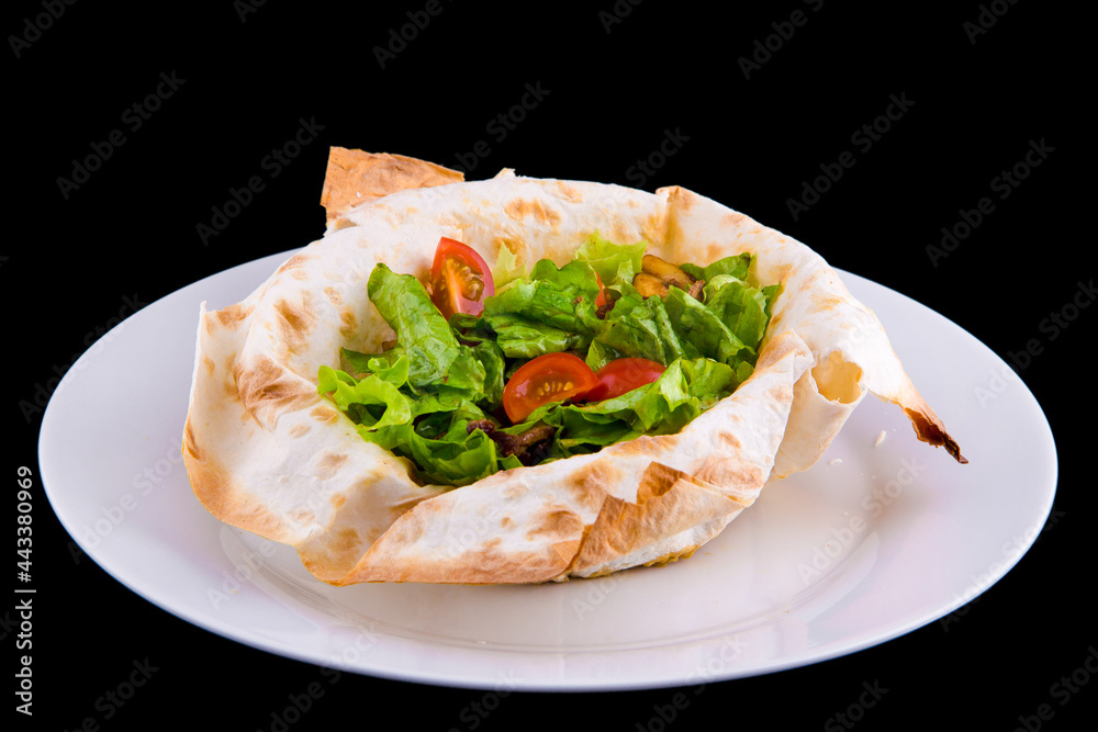Warm salad in thin pita bread: beef, mushrooms, cherry tomatoes, Dijon mustard, cognac. Warm salad in thin pita bread: beef, mushrooms, cherry tomatoes, Dijon mustard, cognac.
