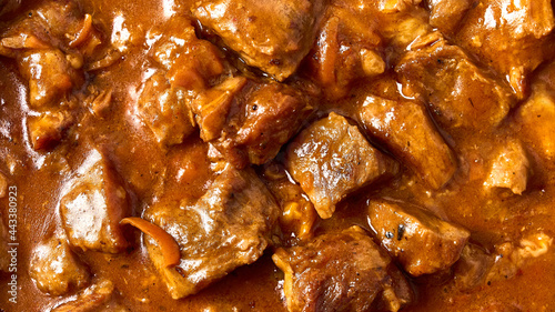Traditional goulash meat food background. Macro, selective focus