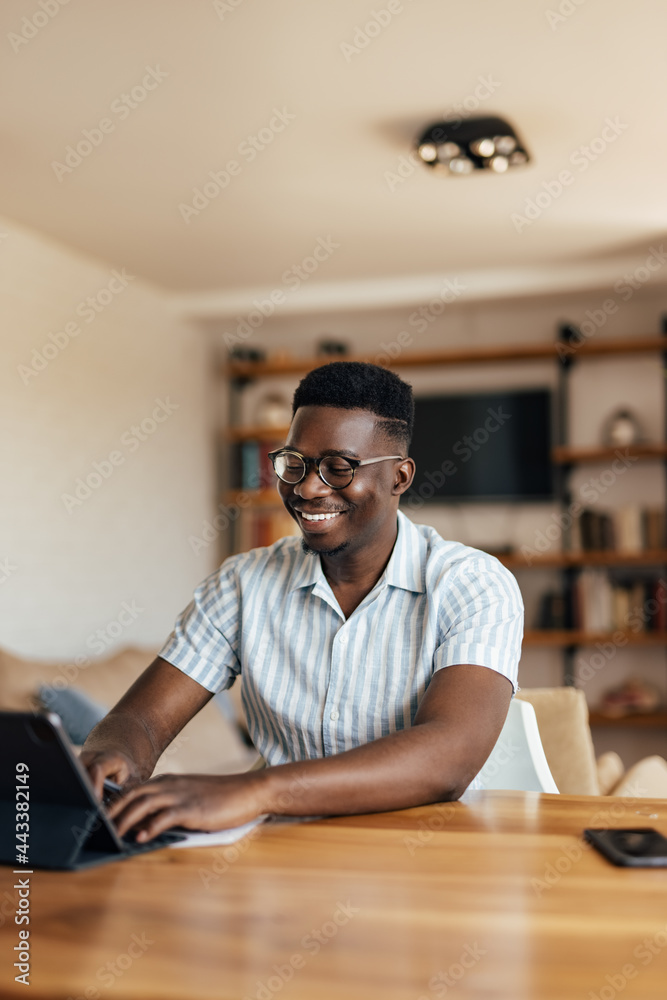 Fototapeta premium Adult black man, talking to his pen friends.