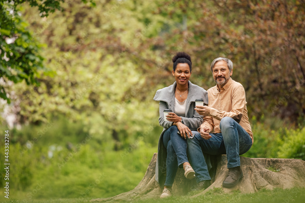 Adult couple, enjoying their drink, outside. Adult couple, enjoying their drink, outside.