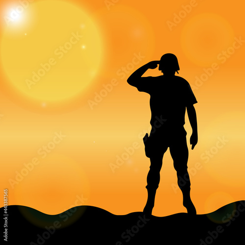 Silhouette of a solider saluting against the sunrise. Concept - protection, patriotism, honor.