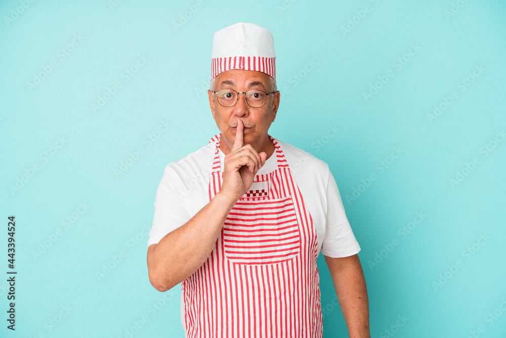 Senior american ice cream man woman holding isolated on blue background keeping a secret or asking for silence. Senior american ice cream man woman holding isolated on blue background keeping a secret or asking for silence.