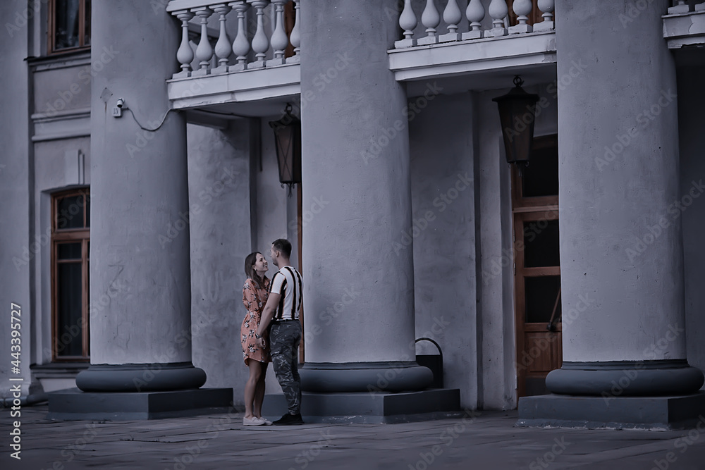 couple in love in the evening city, a man and a woman in a night landscape couple in love in the evening city, a man and a woman in a night landscape