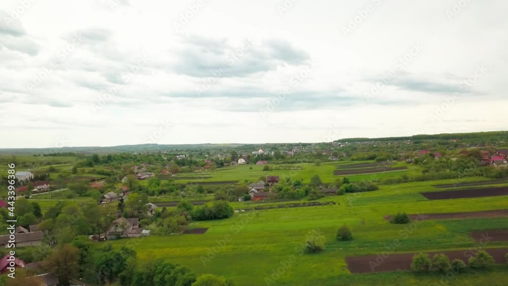 Aerial drone view of green agricultural field in the countryside of Ukraine Aerial drone view of green agricultural field in the countryside of Ukraine