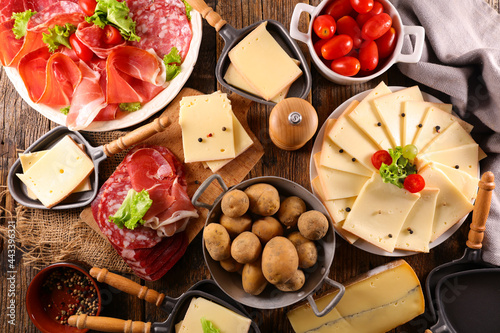 Fototapeta Naklejka Na Ścianę i Meble -  cheese raclette with potato and meat dressing