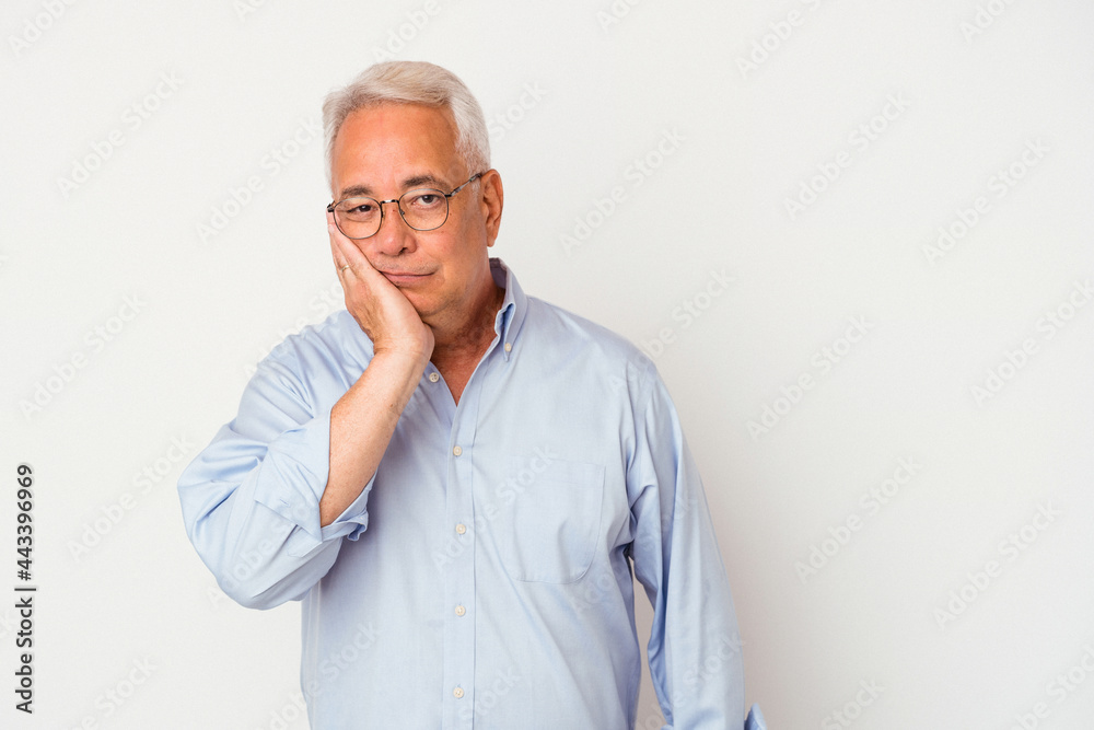 Senior american man isolated on white background who feels sad and pensive, looking at copy space. Senior american man isolated on white background who feels sad and pensive, looking at copy space.