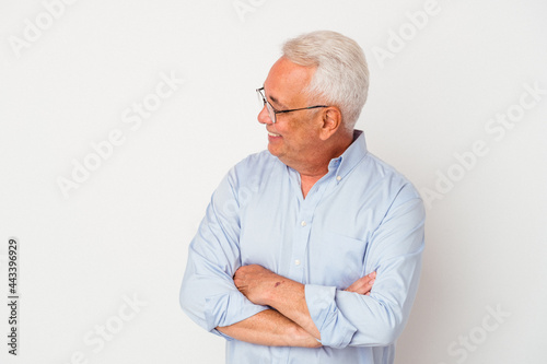 Senior american man isolated on white background smiling confident with crossed arms.