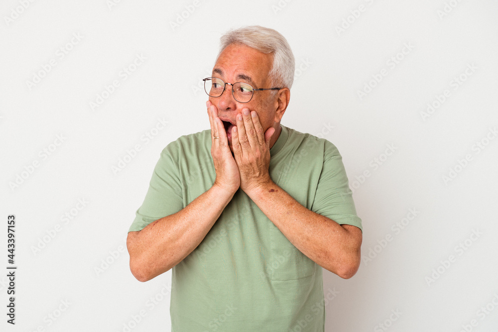 Senior american man isolated on white background scared and afraid. Senior american man isolated on white background scared and afraid.
