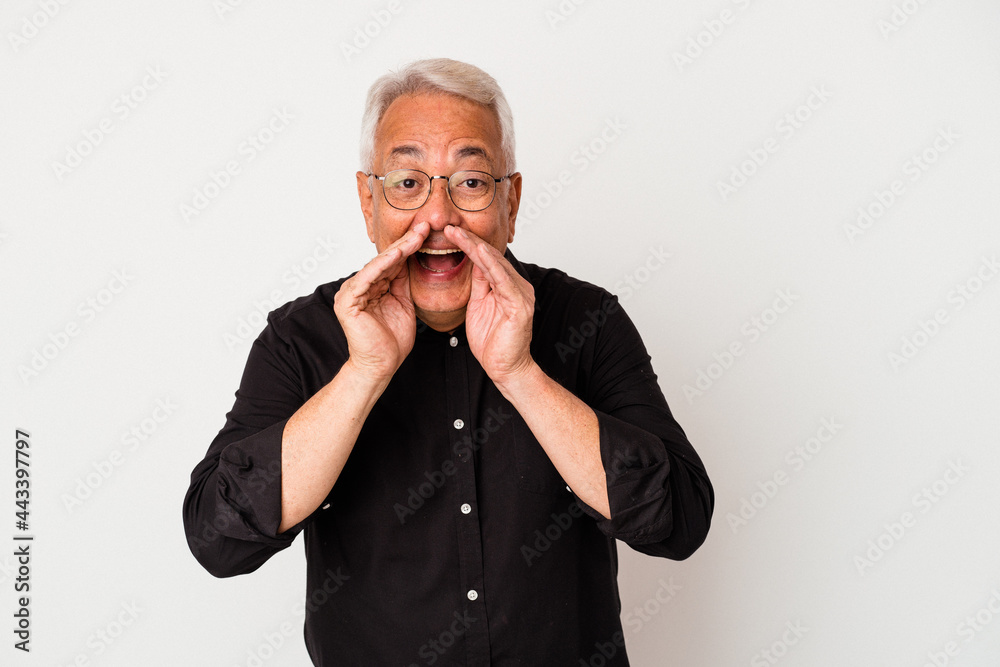 Senior american man isolated on white background saying a gossip, pointing to side reporting something. Senior american man isolated on white background saying a gossip, pointing to side reporting something.