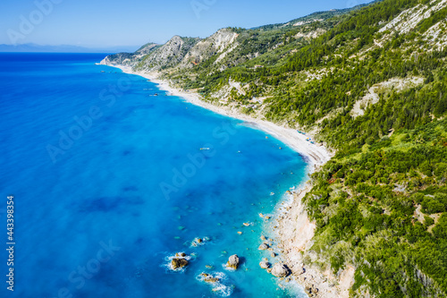 Aerial view of Lefkada coastline. Beautiful beaches, mountains, cypress and pine tree vegetation. Ionian Sea, Greece.