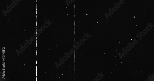 Image of multiple white specks with glitch moving on seamless loop on black background