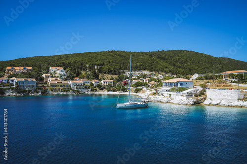 Sailing yacht boat moored close to Fiscardo village in Kefalonia island, Greece