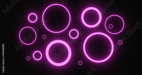 Pulsating pink neon rings in various sizes glowing on black background and tilting