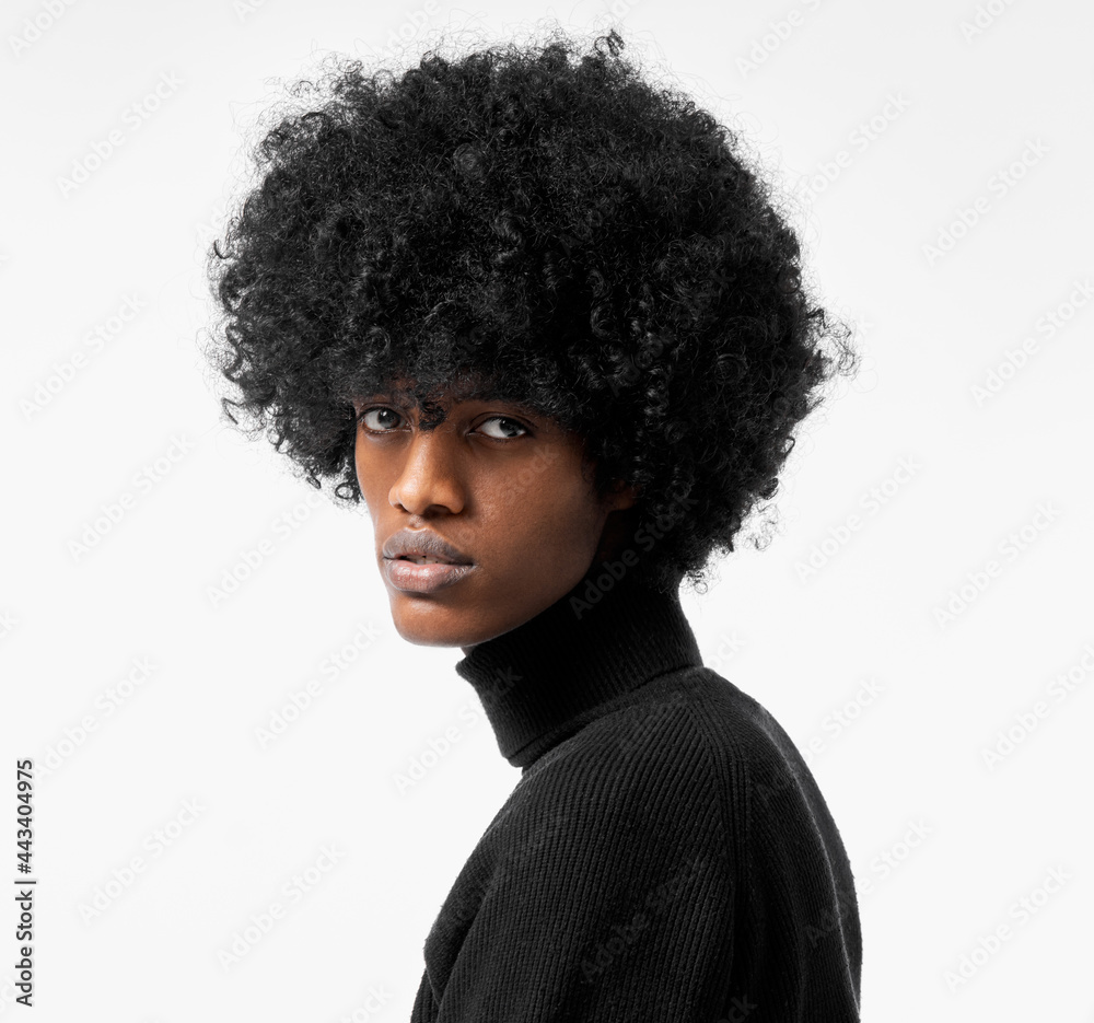 Close-up portrait of young handsome black man with stylish afro isolated on white background - obrazy, fototapety, plakaty 