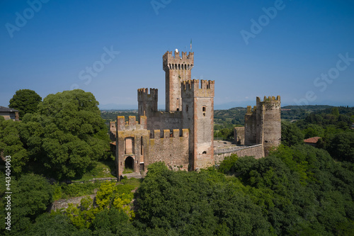 Castle Scaligero in Valeggio sul Mincio, Italy. Aerial view of the Italian historic castle Castello Scaligero on a hill. Aerial panorama of the Scaligero castle, Verona. photo
