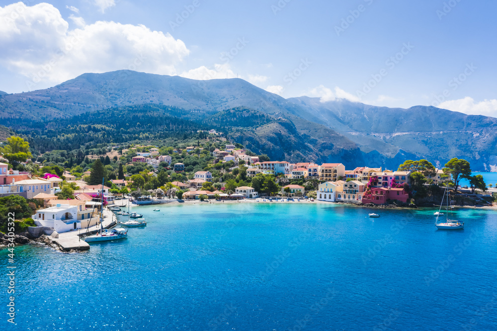 Blue bay of Assos village of Cefalonia island, Greece. Aerial panoramic drone photo travel summer vocation concept
