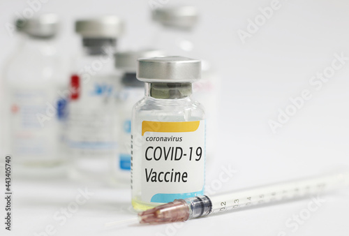 COVID-19 vaccine concept with white background and syringe injection, protective from novel coronavirus 2019.