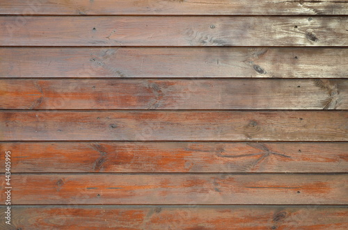  old, worn, painted wooden boards. horizontally located. wood texture for background