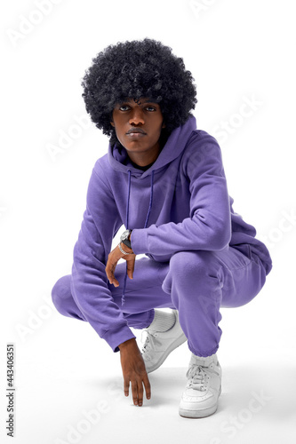 Handsome african american man wear tracksuit isolated on white background