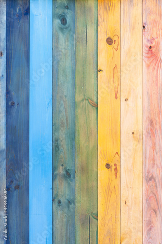 Rainbow painted wooden plank background. summer and lgtb concept.