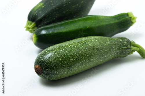 Zucchini on a white background. Vegetable for healthy nutrition. Healthly food