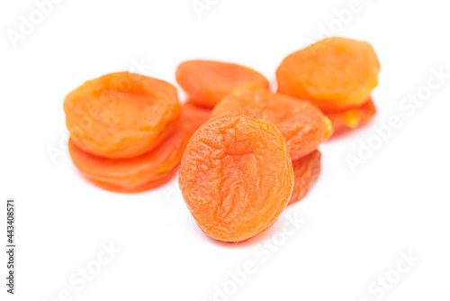 Dried apricots isolated on white, top view