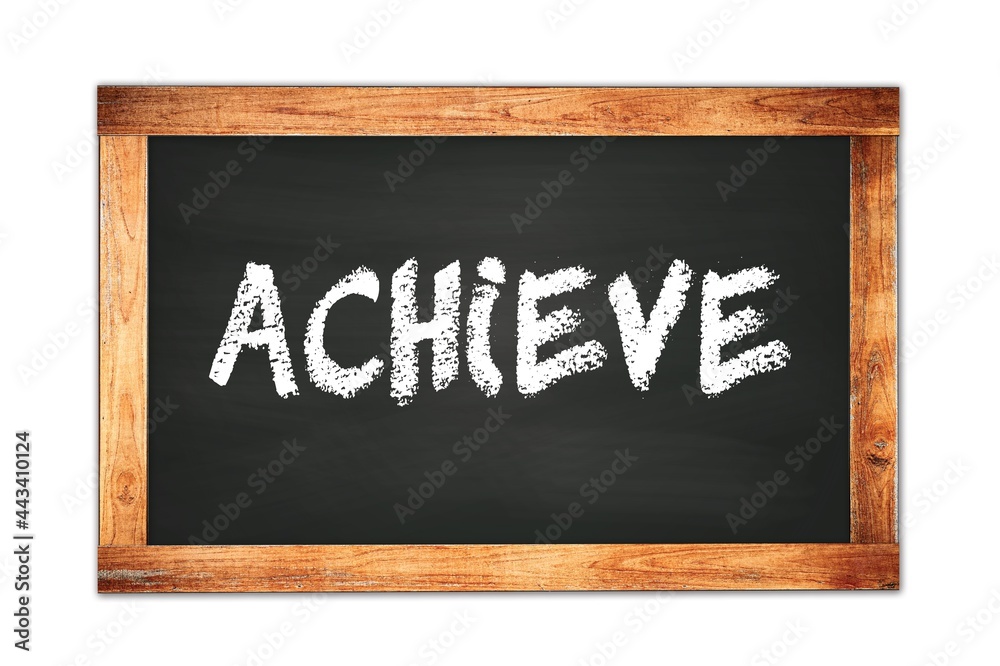 ACHIEVE text written on wooden frame school blackboard. ACHIEVE text written on wooden frame school blackboard.