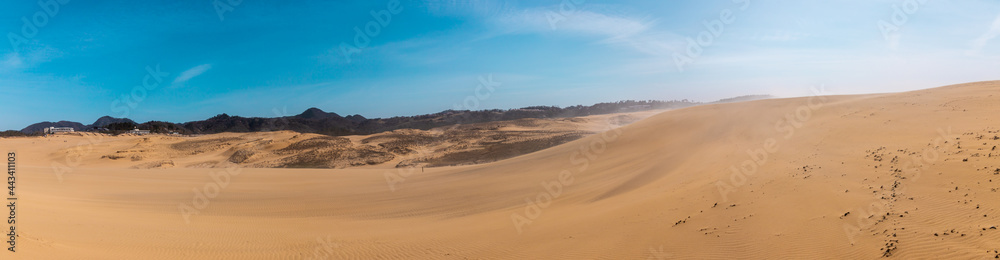 Beautiful Panorama landscape Tottori Sand Dunes (Tottori Sakyu), located near the city of Tottori in Tottori Prefecture, in sunny day. They form the large dune system over 2.4 km in Sanin area, Japan