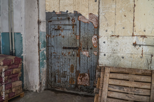 Old authentic wooden door in the workshop