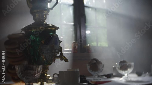 Russian traditions of tea drinking. Russian samovar on the table. still life. tea drinking at the table according to Slavic traditions photo