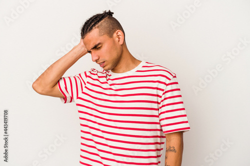 Young venezuelan man isolated on white background celebrating a victory, passion and enthusiasm, happy expression.