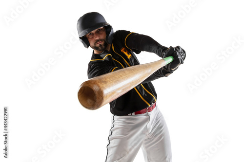 Photography Close-up baseball player, pitcher in a black white sports uniform practicing isolated on a white studio background