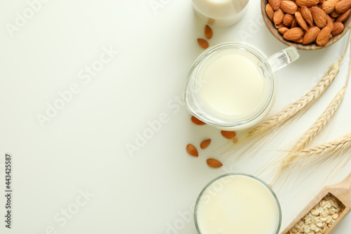 Concept of vegan milk on white background  top view
