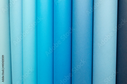 Rolls Of Colored blue Paper Closeup On Background