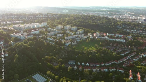 Stuttgart: Aerial view of city in Germany at sunset, city suburb with modern residential buildings and lots of greenery - landscape panorama of Europe from above photo