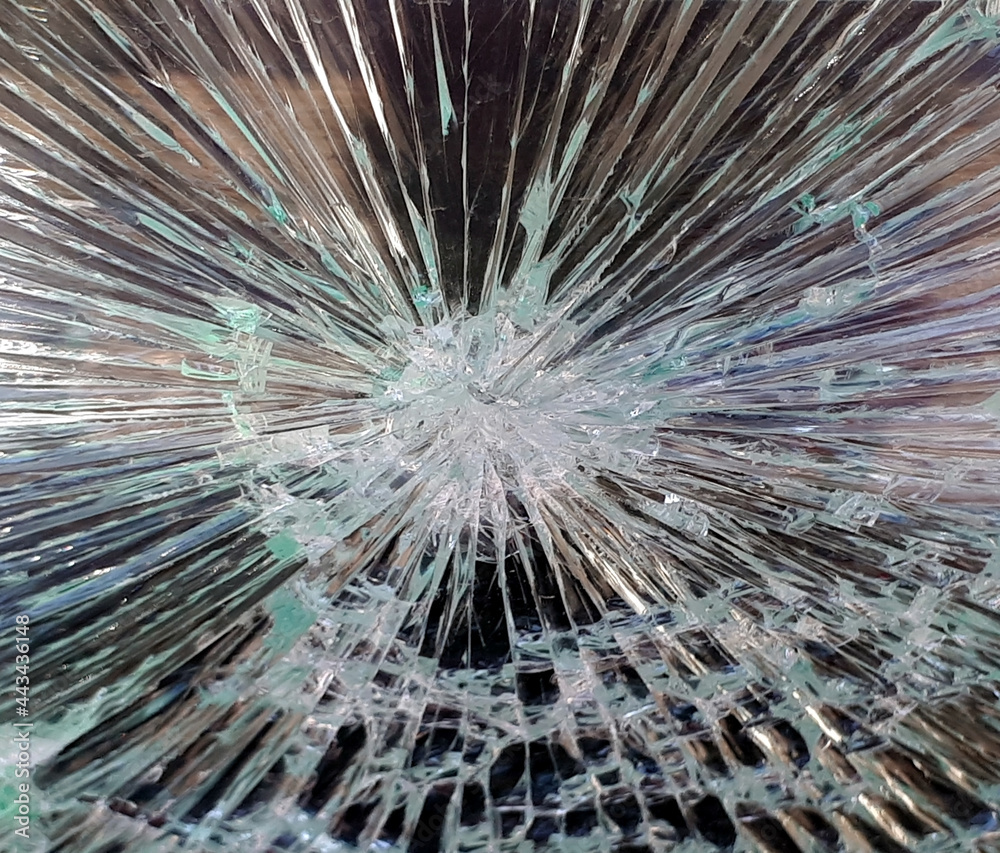 Broken glass showcase close-up, a lot of cracks Broken glass showcase close-up, a lot of cracks