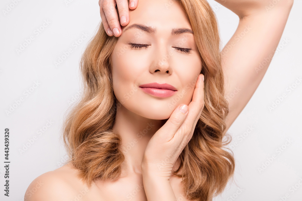 Cropped photo portrait woman enjoying skin care procedures isolated white color background Cropped photo portrait woman enjoying skin care procedures isolated white color background