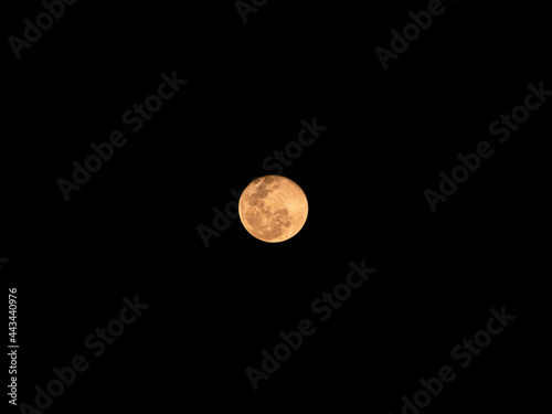 Yellow Moon in The Middle of Frame