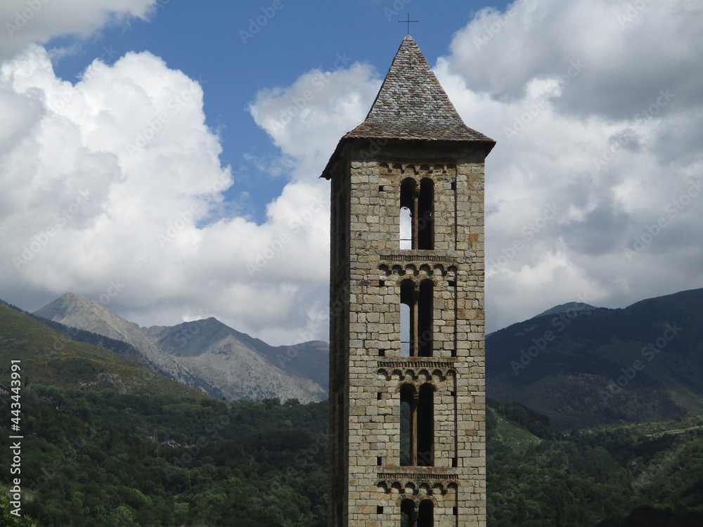 Naklejka premium UNESCO World Heritage. First Romanesque bell tower of the church in the village of Erill la Vall. (11-12 century). Valley of Boi. Spain.